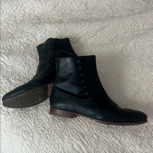 Cole Haan women's Black Leather button detail, Ankle Zip Boots. black leather.